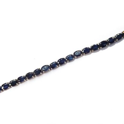 BRACELET articulé en argent (925/°°), orné...