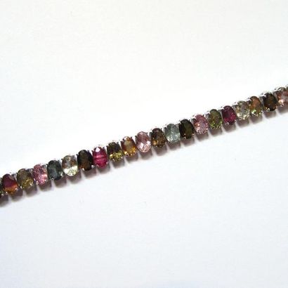 BRACELET articulé en argent (925/°°), orné...