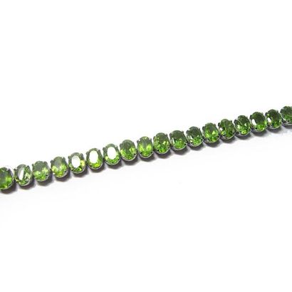BRACELET articulé en argent (925/°°), orné...