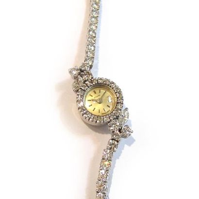 ZENITH. MONTRE BRACELET de dame en or gris...