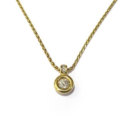 COLLIER en or jaune 18k (750/°°), tour de...