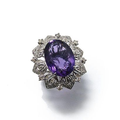 BAGUE fleur en argent (925/°°), ornée d'une...