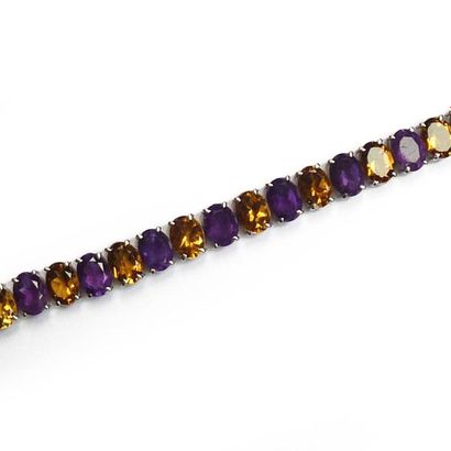 BRACELET articulé en argent (925/°°), orné...