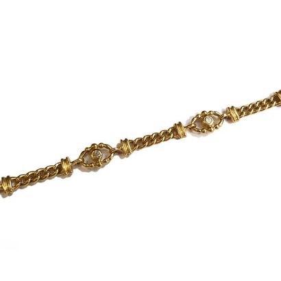 BRACELET articulé en or jaune 18k (750/°°),...