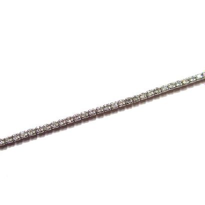 BRACELET articulé en or gris 18k (750/°°),...