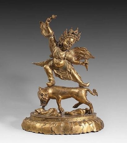 Statuette en bronze doré représentant une...