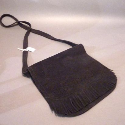 CHRISTIAN DIOR. Petit sac en daim noir à...