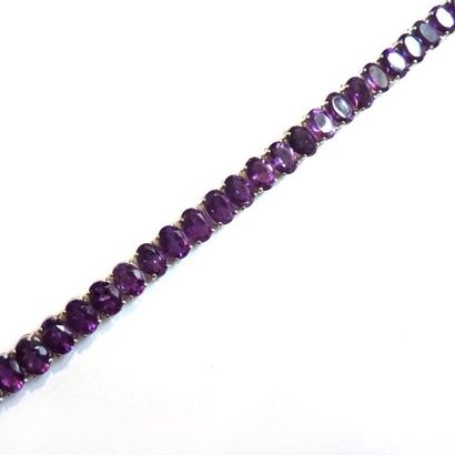 BRACELET articulé en argent (925°/°°), orné...