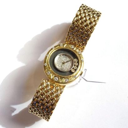 MONTRE de dame en or jaune 18K (750 millièmes)...