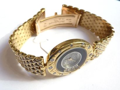 MONTRE de dame en or jaune 18K (750 millièmes)...
