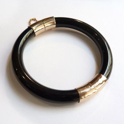 BRACELET jonc rigide ouvrant en métal doré,...