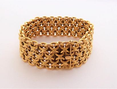 BRACELET en or 18K 750°/°°, manchette maille...