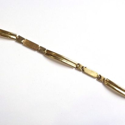 Bracelet gourmette en or 18k (750°/°°). Poids...