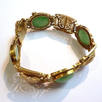 BRACELET articulé en or jaune 18K (750°/°°)...