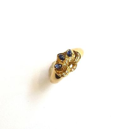BAGUE en or jaune 18k (750°/°°) ajouré, sertie...