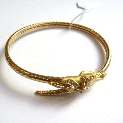 85 BIS. BRACELET jonc en or jaune ciselé...