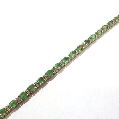 BRACELET articulé en argent (925/°°), orné...