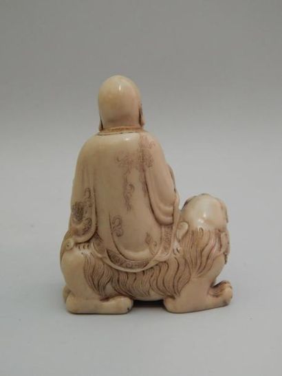 Statuette en stéatite représentant un Lohan...