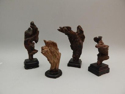 Quatre bois de Lettré. H : 13 à 17.5 cm