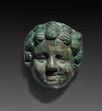 Applique représentant le visage d'un enfant...