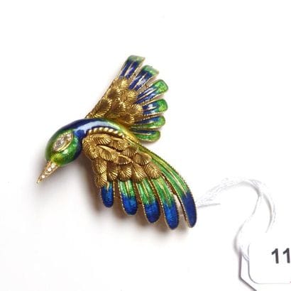 MAUBOUSSIN. BROCHE en or jaune 18K (750°/°°)...