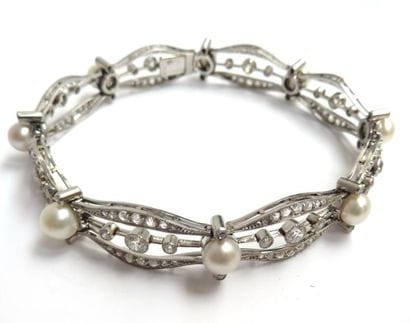 BRACELET en or gris (750/°°) et platine à...