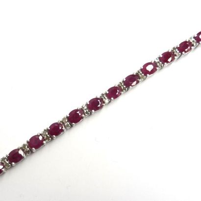 BRACELET articulé en argent (925/°°), orné...