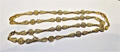 SAUTOIR en or jaune 18K (750/°°), maille...