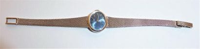 BRACELET MONTRE dame en or blanc 18K (750/°°)...