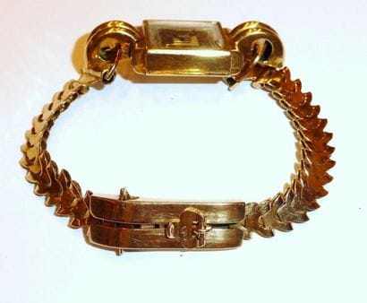 MONTRE en or jaune 18K (750/°°) de style...