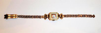 MONTRE en or jaune 18K (750/°°) de style...