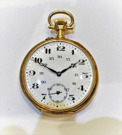 MONTRE A GOUSSET en or jaune 18K (750/°°)...