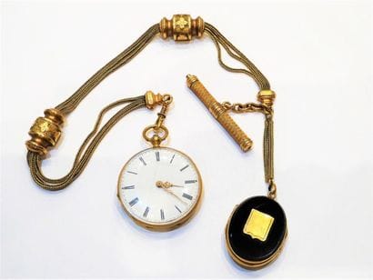 MONTRE A GOUSSET en jaune 18K (750/°°) et...