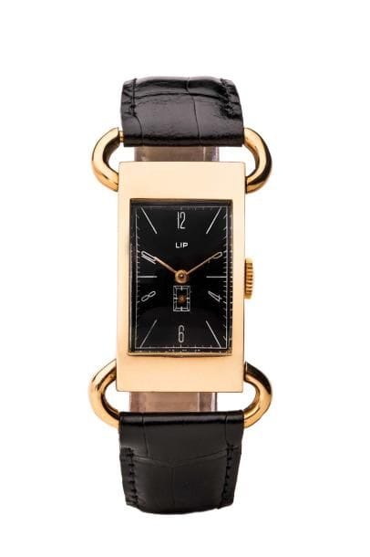 LIP. MONTRE en or jaune 18K (750/°°), avec...