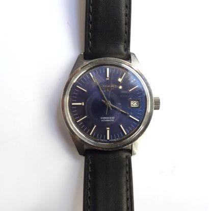 LONGINES. MONTRE en acier, modèle CONQUEST...
