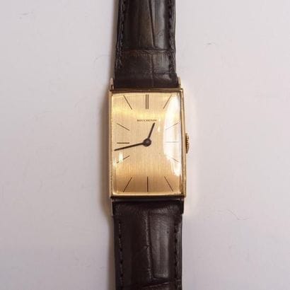 BOUCHERON. MONTRE bracelet homme en or jaune...