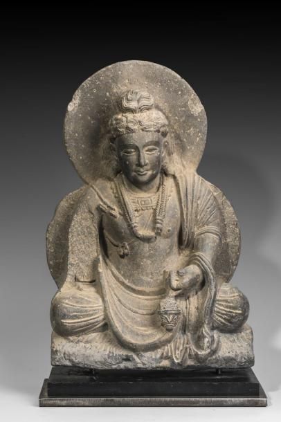 Bodhisattva auréolé assis en schiste. Il...