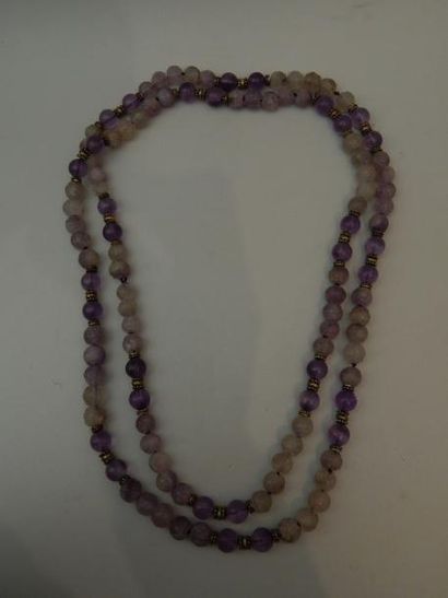Collier en cristal de roche et améthyste....