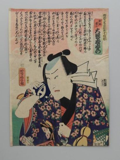 Yoshitora, acteur en buste tenant un tsuba....