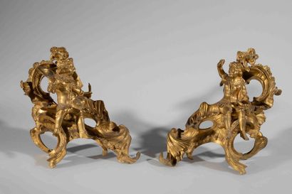 Paire de chenets en bronze ciselé et doré,...
