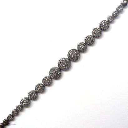 BRACELET articulé en argent noirci (925/°°)...