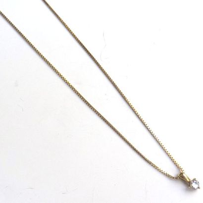 CHAINE et PENDENTIF en or jaune 18K (750/°°)...