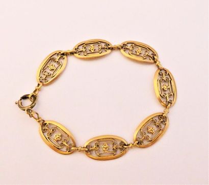 BRACELET en or 18K (750/°°) à maille filigranée,...