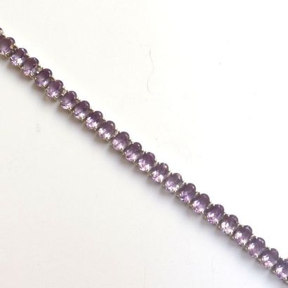 BRACELET articulé en argent (925/°°), orné...