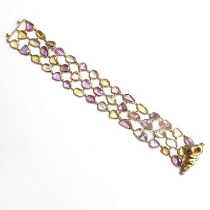 BRACELET en or jaune 18K (750/°°) à trois...