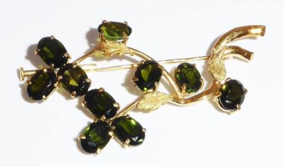 BROCHE en or 18k( 750/°° ) ornée de tourmalines...