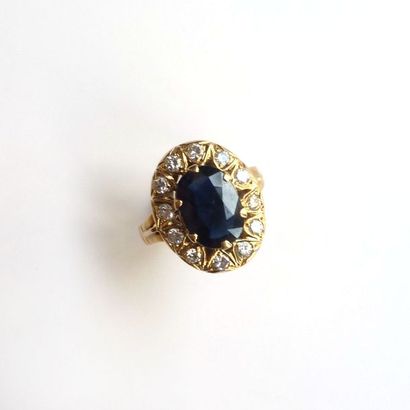BAGUE en or jaune 18K (750/°°) à monture...