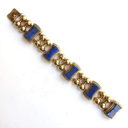 BRACELET en or jaune 18K (750/°°) articulé...