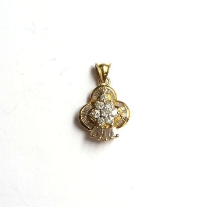 Pendentif en or jaune (750/°°) en forme de...