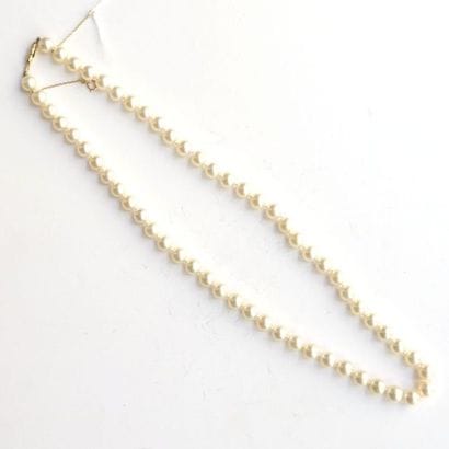 PARURE en or jaune 18K (750/°°) composée...